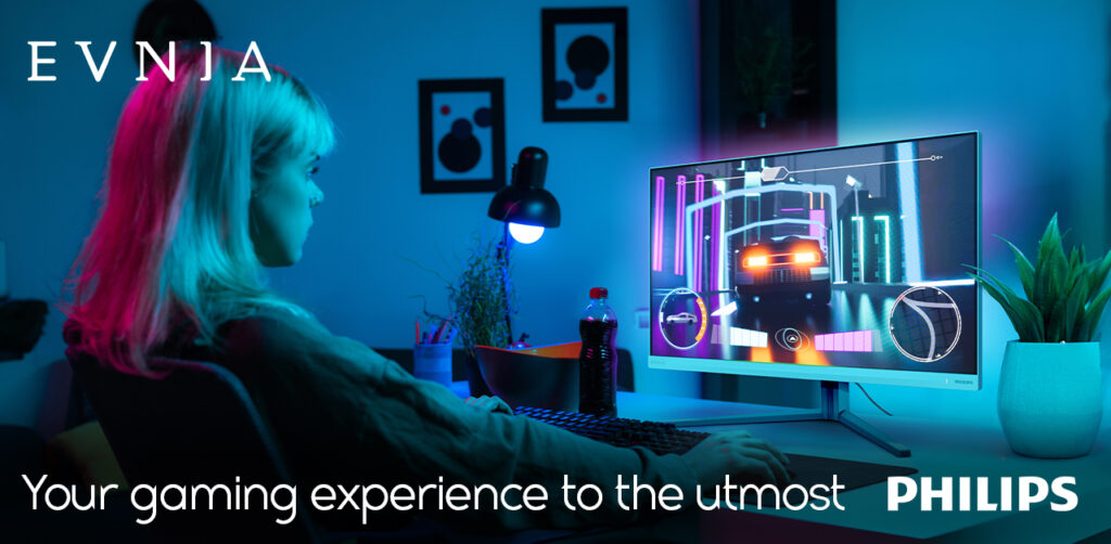 Original Philips Evnia press image showing the monitor and colored Ambiglow lighting in a gaming setup