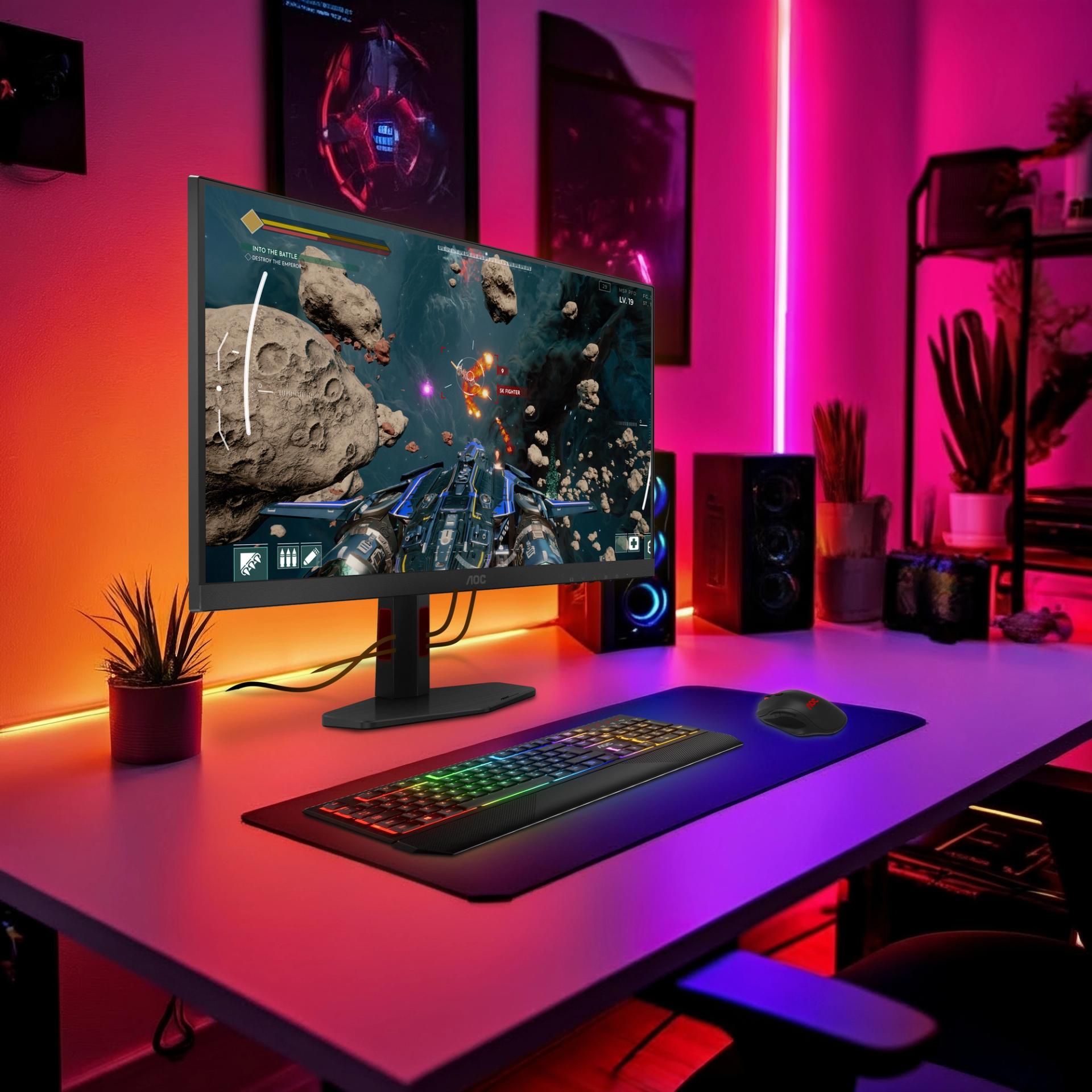 Monitor AOC G4 na biurku z kolorowym oświetleniem w ilustracji premierowej 24G4ZR i 27G4ZR.