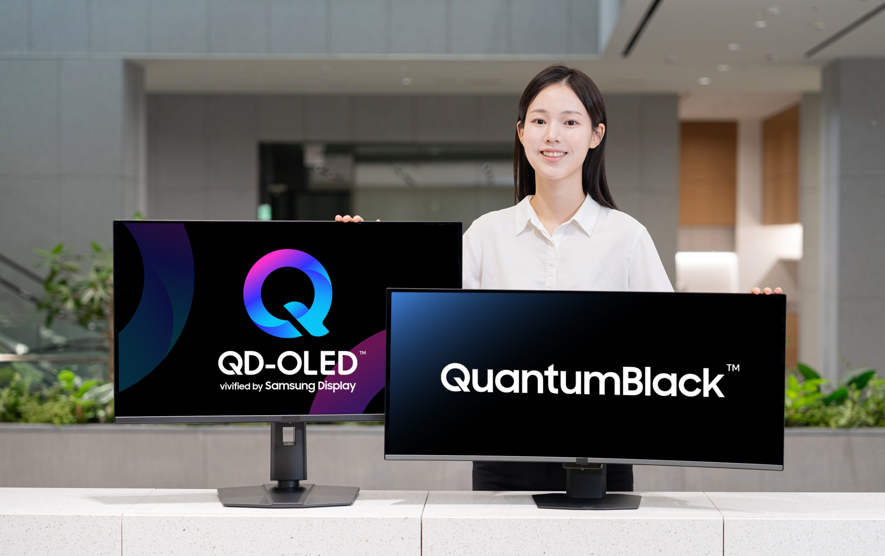 Two QD-OLED monitors present Samsung Display’s QuantumBlack surface technology.