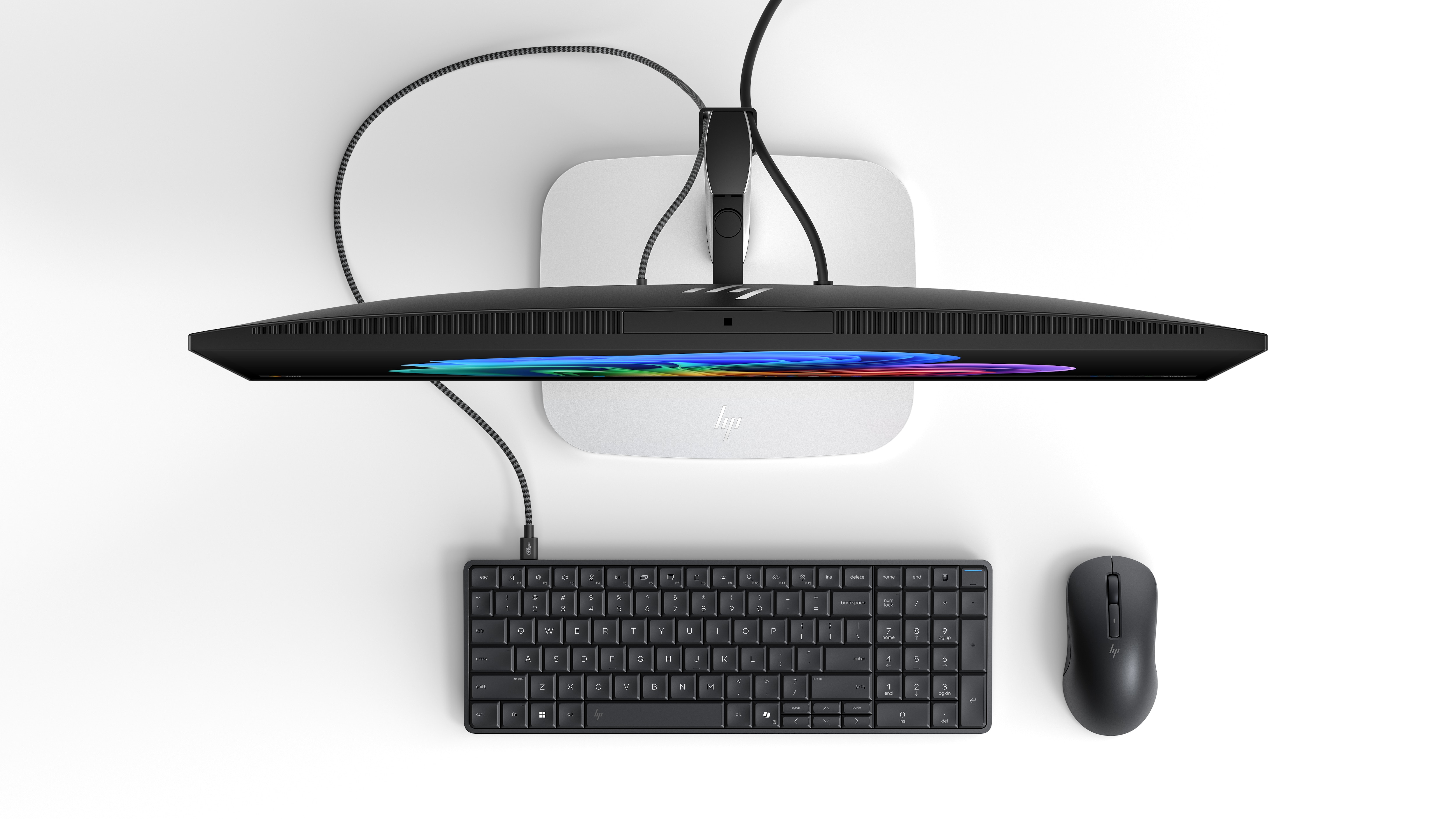 Overhead view of an HP monitor and EliteBoard workstation from the original CES announcement.