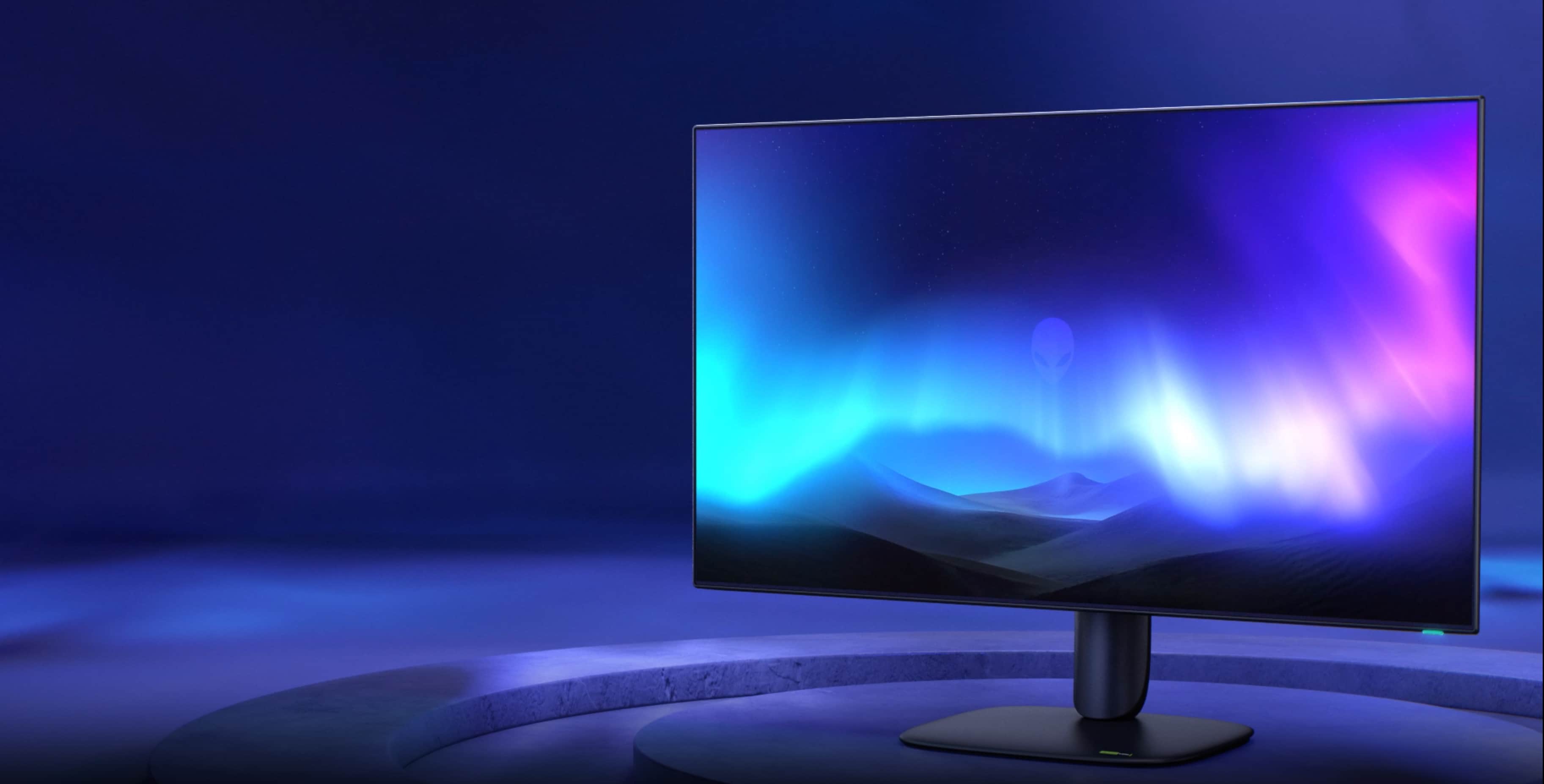 Alienware AW3226Q monitor with an aurora image against the original blue and purple background