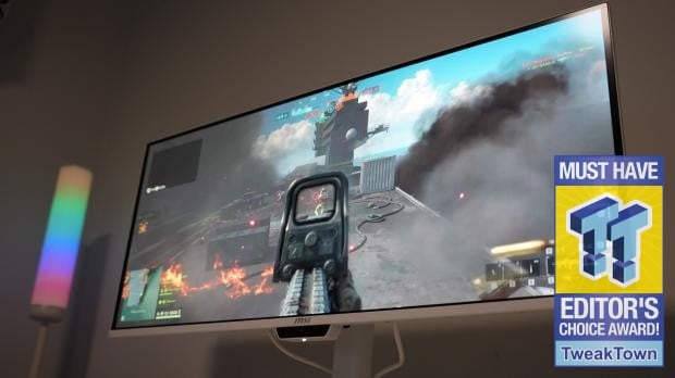 White MSI ultrawide displaying a shooter game, with the original TweakTown award badge